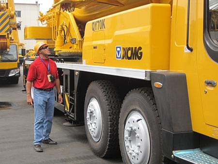 Client from USA was inspecting XCMG truck crane QY70K
